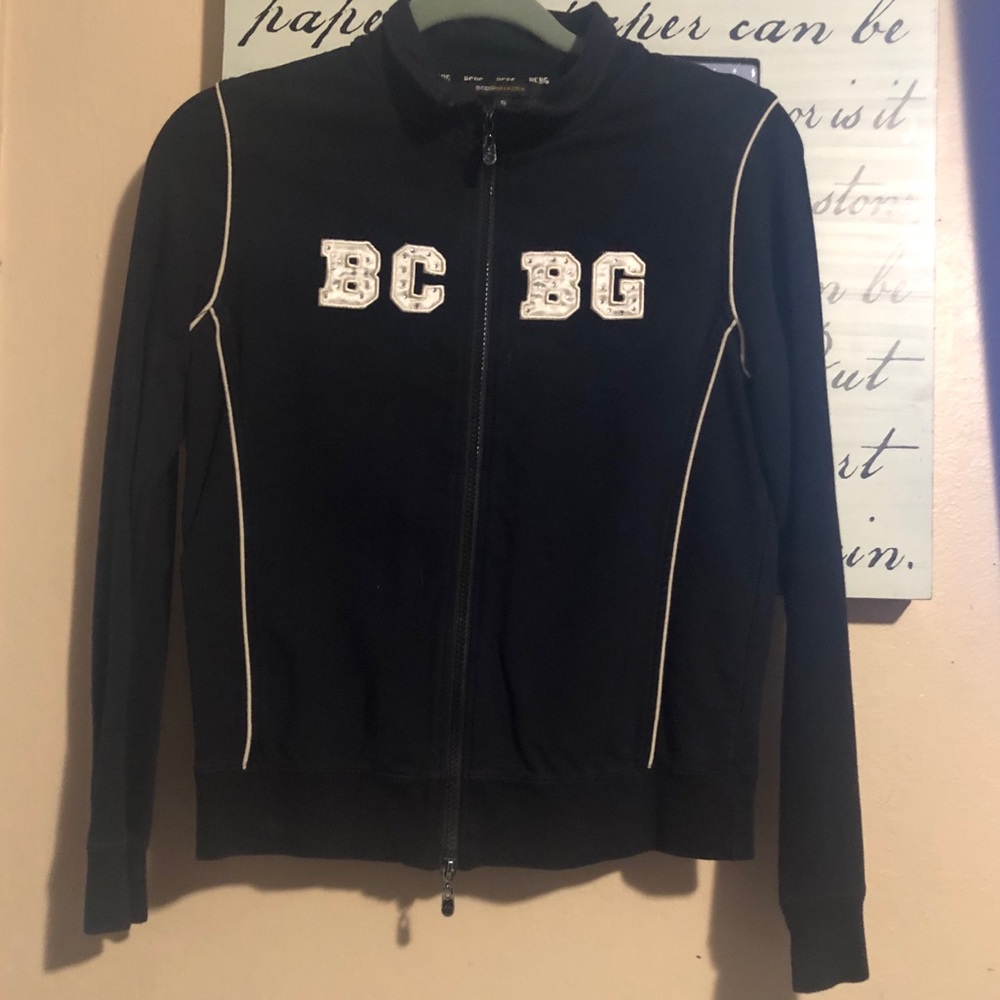 Size M. BCBG. Black zip up sweater